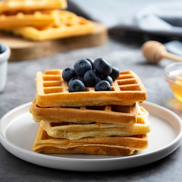 Warm and fluffy waffles topped with blueberries