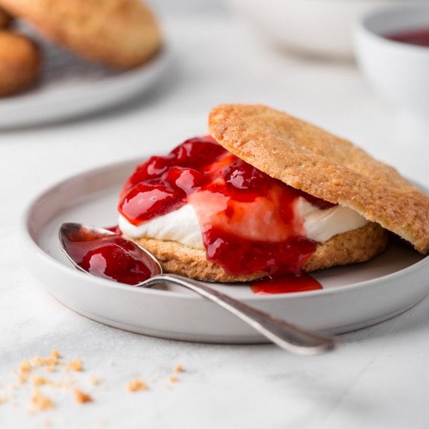 Fresh strawberry shortcake served in between a warm biscuit